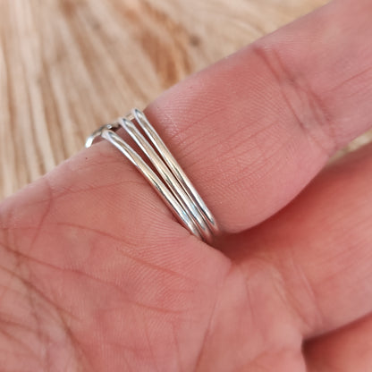 1.5mm thick ring bands shown from the underside of the hand.